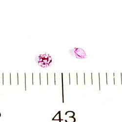 Cubic zircon rund rosa (varm/gultonad) 2 mm